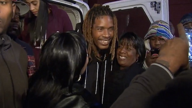 Willie Maxwell Fetty Wap hugs neighbors after distributing Thanksgiving turkeys in Patterson